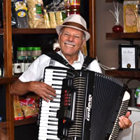 Enjoy Ed's solo accordion while enjoying the delicious tapas at Molto Bene Caffé e Mercado Italiano